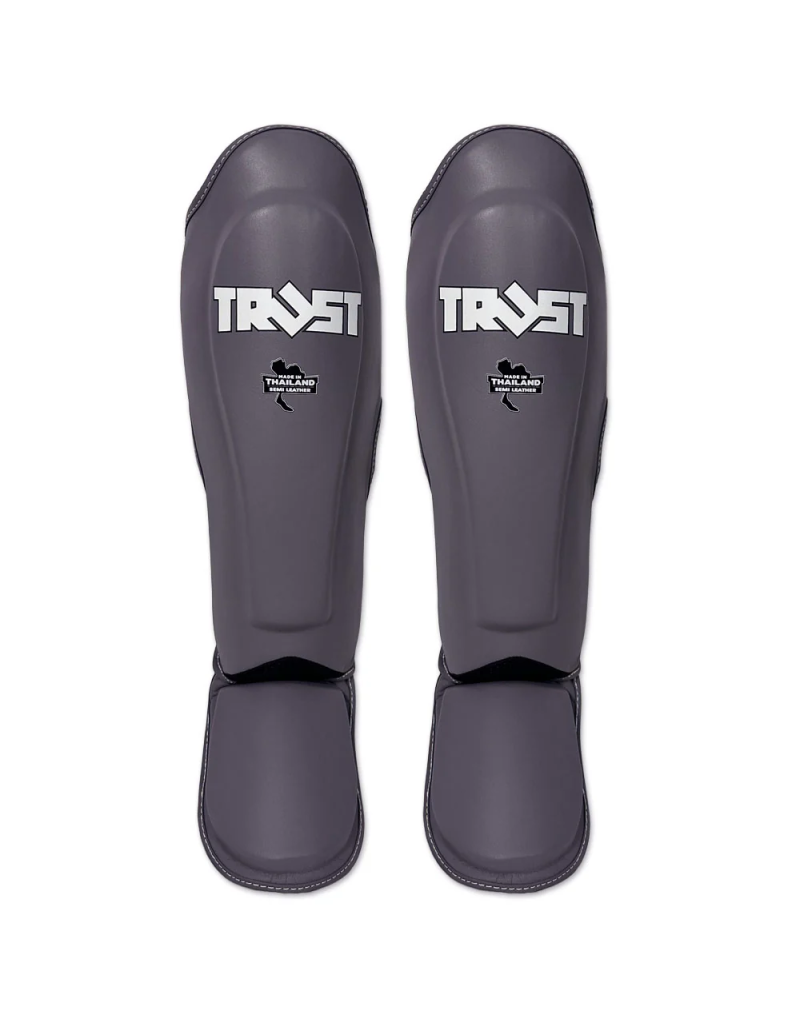Espinilleras Trust Icon Gris | Diseño Sobrio y Profesional